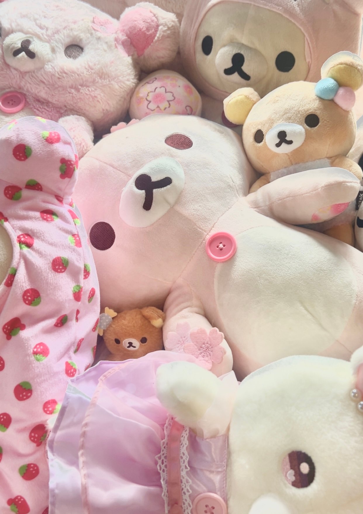 A real Plushboard collector's shelf, piled with Rilakkuma and friends